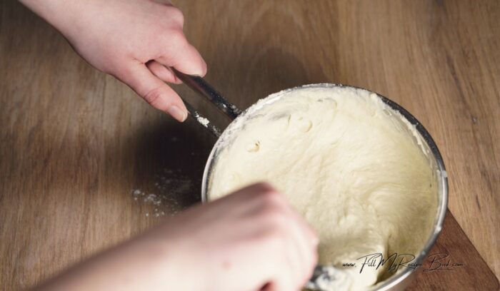 a sticky dough mix for homemade, baking powder vetkoek, to fry in hot oil. Quick No Yeast Vetkoek Recipe idea. Crispy South African mouth watering vetkoek made with baking powder fried in hot oil for a meal.