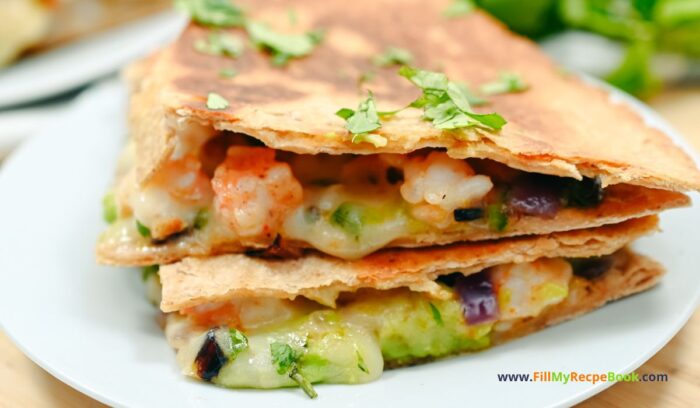 Spicy Tasty Keto Shrimp Quesadillas recipe idea to create for lunch or dinner. Pan sautéed shrimp and chili, cumin and jalapeño with avocado.