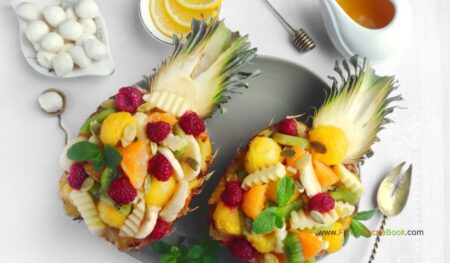 A healthy Tropical Pineapple Fruit Salad recipe. This simple homemade fresh fruit salad is a perfect summer treat that kids absolutely adore.