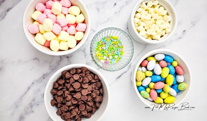 Ingredients for Easter Rocky Road Candy.
Dark and a little white chocolate to melt the mini marshmallows and colorful small eggs in. for easter bars, dessert.