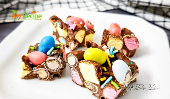 Simple Easter Rocky Road Candy recipe. A Dark chocolate no bake idea filled with marshmallows, mini eggs for an easy snack or treat.