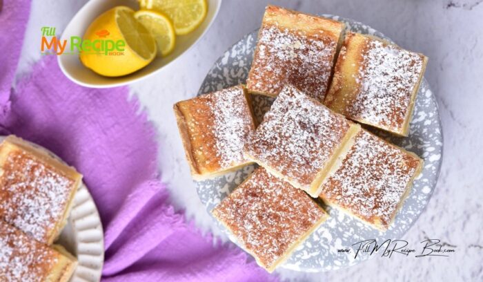 A Homemade Lemon Bars Recipe idea. Bake this buttery shortbread base with lemon zest and juice topping dusted with powdered sugar.