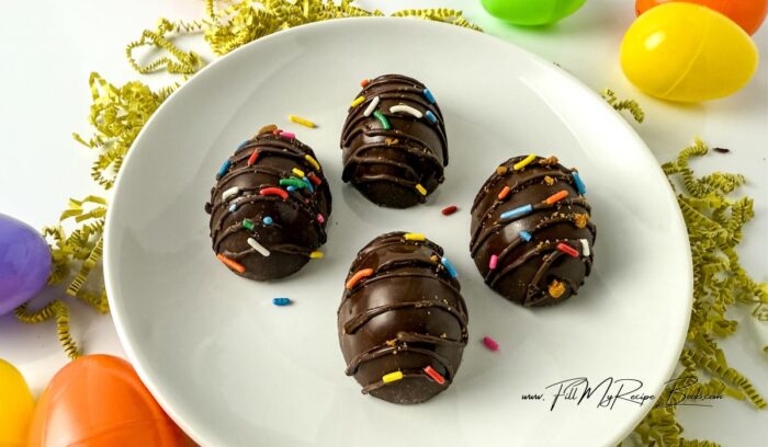 Marshmallow Chocolate Eggs Recipe with cookie butter. Best DIY homemade idea with a mold, filled marshmallow fluff, decorated with sprinkles.