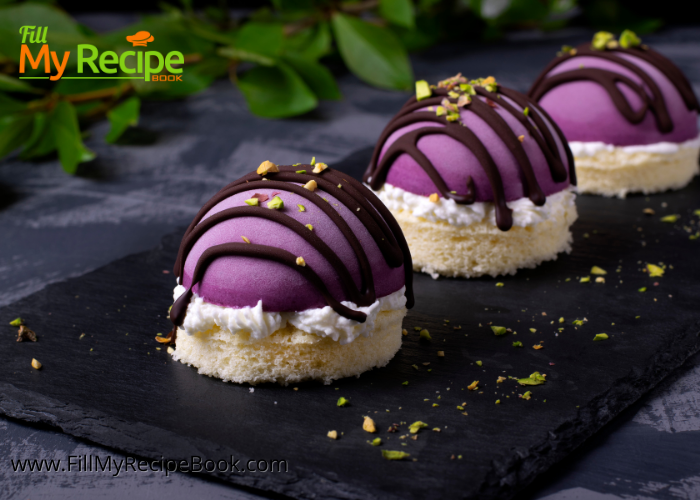 Mini Blueberry Mousse Cakes Glazed Recipe. A gelatin set dessert with a base of almond sponge cake with blueberry mousse fillings.