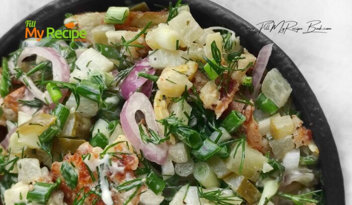 Add the potatoes and celery to the bowl. Mix together the mayonnaise, brine and mustard. Dress the salad and adjust the flavor with salt. Stir and leave the salad overnight in the refrigerator to allow the flavors to combine.